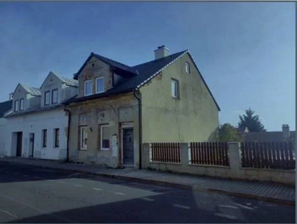 Spoluvlastnický podíl 1/8 pozemku a rodinného domu Litvínov